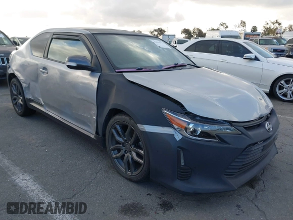 2014 Scion tC z VIN JTKJF5C79E3073875, wystawiony jako IAAI lot #41536021 z przebiegiem 158 154 mil mil oraz . Historia ofert i sprzedaży dostępna na DreamBid. Obrazek 1.