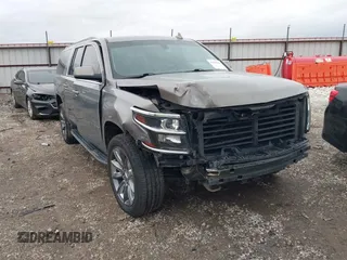 2018 Chevrolet Suburban LS z VIN 1GNSKGKC4JR253149, wystawiony jako IAAI lot #41455069 z przebiegiem 148 165 mil mil oraz . Historia ofert i sprzedaży dostępna na DreamBid. Obrazek 1.