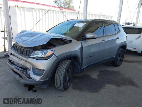 2019 Jeep Compass Latitude with VIN 3C4NJDBB4KT754484, listed as a IAAI auction lot 42324284 with 85,637 mi miles and . Bid and sale history available at DreamBid. Image 2.