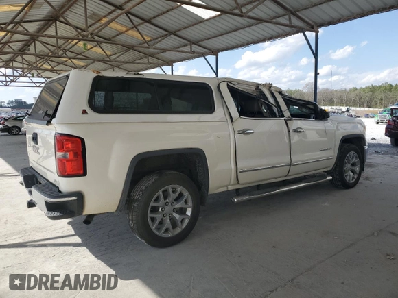 2014 GMC Sierra 1500 SLT with VIN 3GTP1VEC1EG190700, listed as a Copart auction lot 48573715 with 133,563 mi miles and Salvage title. Bid and sale history available at DreamBid. Image 3.
