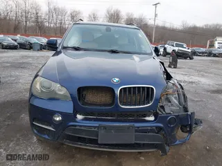 2011 BMW X5 35i with VIN 5UXZV4C54BL738262, listed as a IAAI auction lot 41633474 with 173,914 mi miles. Bid and sale history available at carsss.com. Image 12.