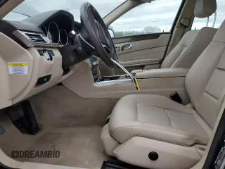 2014 Mercedes-Benz E 350 Luxury with VIN WDDHH8JB6EA809262, listed as a Copart auction lot 51817555 with 122,948 mi miles and Salvage Title. Bid and sale history available at DreamBid. Image 7.