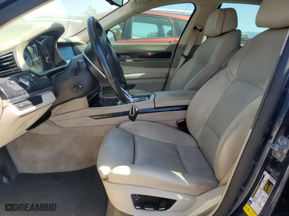 2009 BMW 7 Series 750i with VIN WBAKA83509CY35388, listed as a Copart auction lot 63561984 with 166,068 mi miles and Salvage Title. Bid and sale history available at carsss.com. Image 7.