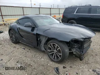 2021 Toyota GR Supra 2.0 with VIN WZ1DB2C02MW045335, listed as a Copart auction lot 72138744 with 37,882 mi miles and Salvage Title. Bid and sale history available at carsss.com. Image 4.