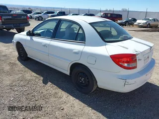 2003 Kia Rio with VIN KNADC125836211761, listed as a IAAI auction lot 41637622 with 117,010 mi miles. Bid and sale history available at carsss.com. Image 3.
