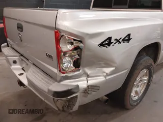 2005 Dodge Dakota SLT with VIN 1D7HW48N15S164352, listed as a IAAI auction lot 42190403 with 150,794 mi miles and . Bid and sale history available at carsss.com. Image 6.