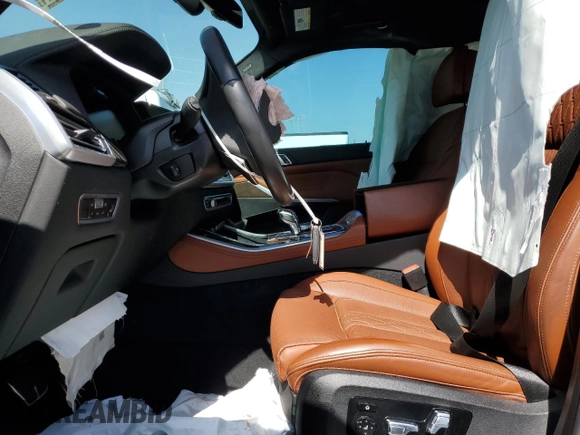 2023 BMW X5 xDrive45e with VIN 5UXTA6C0XP9P49482, listed as a Copart auction lot 56730735 with Not provided miles and Salvage title. Bid and sale history available at DreamBid. Image 7.