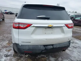 2021 Chevrolet Traverse LT with VIN 1GNERHKWXMJ218191, listed as a IAAI auction lot 41512332 with 87,206 mi miles and . Bid and sale history available at DreamBid. Image 16.