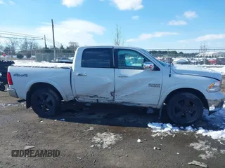2018 Ram 1500 Big Horn z VIN 1C6RR7LG1JS113662, wystawiony jako IAAI lot #41274107 z przebiegiem 112 500 mil mil oraz . Historia ofert i sprzedaży dostępna na DreamBid. Obrazek 13.
