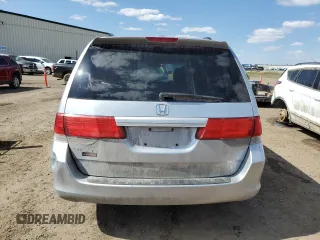 2010 Honda Odyssey EX-L with VIN 5FNRL3H60AB501157, listed as a Copart auction lot 54698995 with 277,974 mi miles and Salvage Title. Bid and sale history available at carsss.com. Image 6.