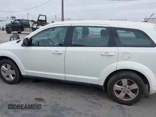 2013 Dodge Journey American Value with VIN 3C4PDCAB9DT547538, listed as a IAAI auction lot 42407702 with 152,659 mi miles and . Bid and sale history available at DreamBid. Image 14.