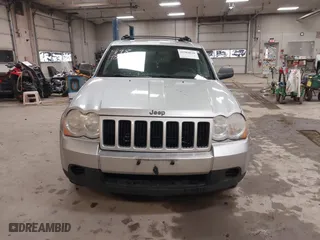 2009 Jeep Grand Cherokee Laredo with VIN 1J8GR48K89C553694, listed as a IAAI auction lot 41984820 with 196,266 mi miles. Bid and sale history available at carsss.com. Image 13.