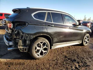 2018 BMW X1 xDrive28i with VIN WBXHT3C37J3H32374, listed as a Copart auction lot 70226702 with 65,796 mi miles. Bid and sale history available at carsss.com. Image 3.
