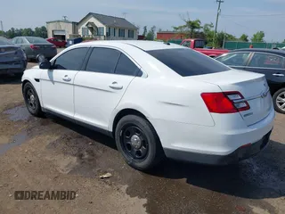 2014 Ford Police Interceptor with VIN 1FAHP2MKXEG100925, listed as a IAAI auction lot 42491379 with 97,937 mi miles and . Bid and sale history available at DreamBid. Image 3.