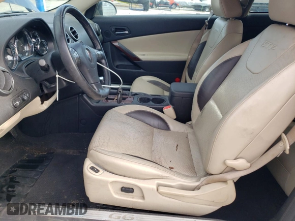 2006 Pontiac G6 GTP with VIN 1G2ZM151864155534, listed as a Copart auction lot 86558214 with 207,585 mi miles and Salvage Title. Bid and sale history available at carsss.com. Image 7.