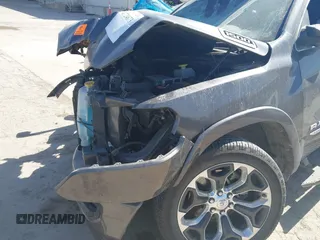2021 Ram 1500 Limited with VIN 1C6SRFHT6MN746520, listed as a IAAI auction lot 41724673 with 38,440 mi miles and . Bid and sale history available at DreamBid. Image 6.
