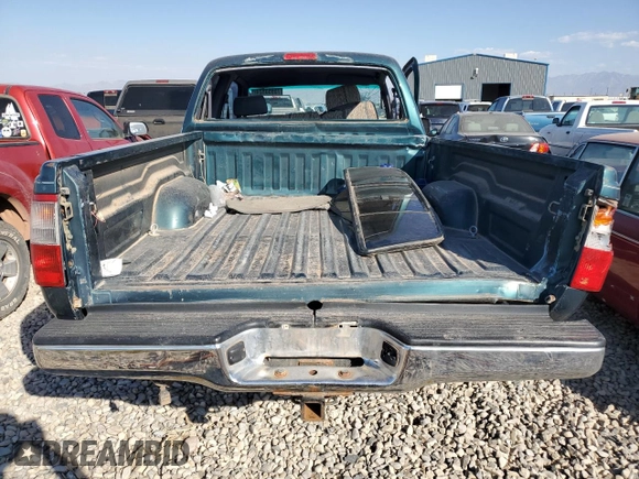 1997 Toyota T100 DX with VIN JT4UN22D7V0035205, listed as a Copart auction lot 75953824 with 196,449 mi miles and Salvage Title. Bid and sale history available at DreamBid. Image 6.