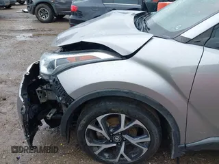 2018 Toyota C-HR XLE z VIN NMTKHMBX8JR034946, wystawiony jako IAAI lot #41947667 z przebiegiem 84 196 mil mil oraz . Historia ofert i sprzedaży dostępna na DreamBid. Obrazek 6.
