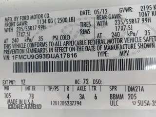 2013 Ford Escape SE with VIN 1FMCU9G93DUA17816, listed as a IAAI auction lot 41688140 with 129,738 mi miles. Bid and sale history available at carsss.com. Image 9.