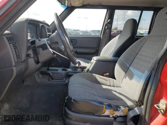 2000 Jeep Cherokee with VIN 1J4FF48S0YL113246, listed as a Copart auction lot 51861455 with 180,965 mi miles and Clean title. Bid and sale history available at DreamBid. Image 7.