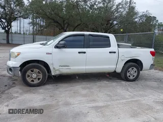 2010 Toyota Tundra with VIN 5TFEY5F12AX083418, listed as a IAAI auction lot 41352739 with 279,971 mi miles and . Bid and sale history available at DreamBid. Image 14.