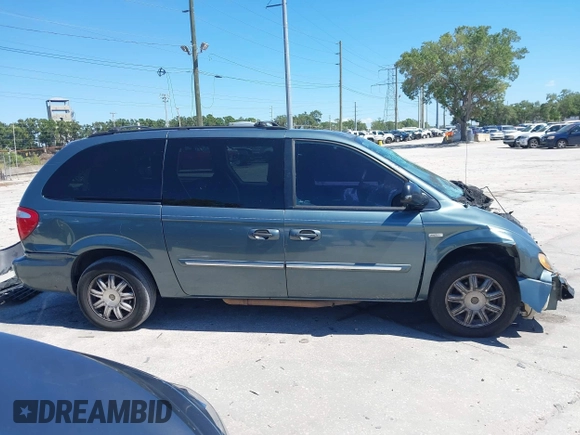 2007 Chrysler Town & Country Touring with VIN 2A4GP54LX7R183977, listed as a IAAI auction lot 42049186 with Not Provided miles and . Bid and sale history available at DreamBid. Image 14.