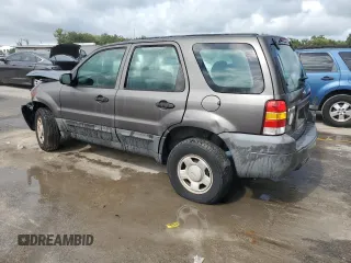 2005 Ford Escape XLS Value with VIN 1FMYU02Z35KA59568, listed as a Copart auction lot 71720604 with 184,007 mi miles and Salvage Title. Bid and sale history available at carsss.com. Image 2.
