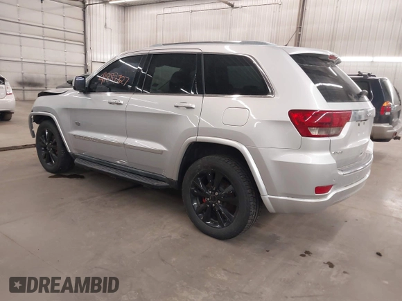 2011 Jeep Grand Cherokee Laredo with VIN 1J4RR4GGXBC684171, listed as a IAAI auction lot 41889727 with 141,202 mi miles and . Bid and sale history available at DreamBid. Image 3.