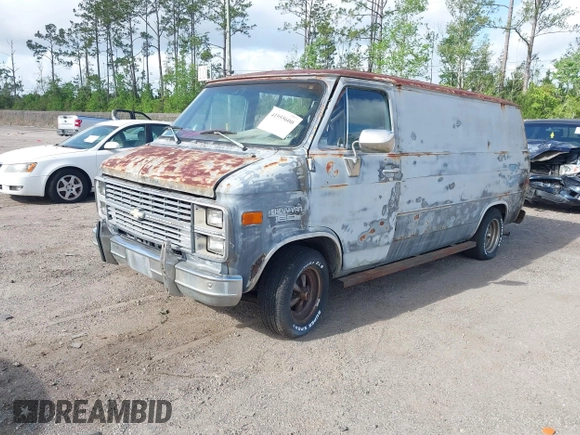 1983 Chevrolet Chevy Van z VIN 1GCEG25H7D7170543, wystawiony jako IAAI lot #41955600 z przebiegiem 49 027 mil mil oraz . Historia ofert i sprzedaży dostępna na DreamBid. Obrazek 2.