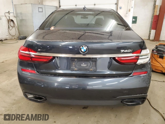 2019 BMW 7 Series 740i xDrive with VIN WBA7E4C51KGV70174, listed as a Copart auction lot 54117075 with 48,743 mi miles and Salvage Title. Bid and sale history available at carsss.com. Image 6.