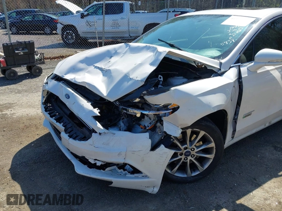 2018 Ford Fusion Energi SE with VIN 3FA6P0PU9JR105934, listed as a IAAI auction lot 41935227 with 149,863 mi miles. Bid and sale history available at carsss.com. Image 6.