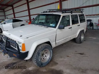 1996 Jeep Cherokee Sport with VIN 1J4FJ68S5TL259449, listed as a IAAI auction lot 42376697 with 72,835 mi miles and . Bid and sale history available at DreamBid. Image 6.
