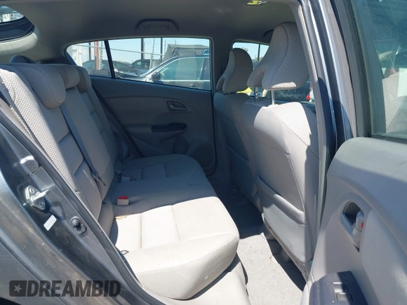 2010 Honda Insight EX with VIN JHMZE2H72AS015870, listed as a IAAI auction lot 42762384 with 58,121 mi miles and . Bid and sale history available at DreamBid. Image 8.