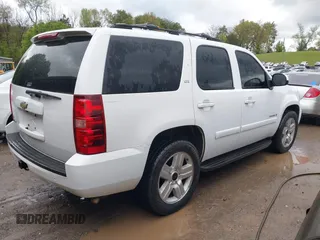 2007 Chevrolet Tahoe LT z VIN 1GNFC13J37R113756, wystawiony jako IAAI lot #42021634 z przebiegiem 247 631 mil mil oraz . Historia ofert i sprzedaży dostępna na DreamBid. Obrazek 4.