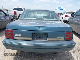 1996 Oldsmobile Cutlass Ciera 1SA VX5 z VIN 1G3AJ55M5T6418193, wystawiony jako IAAI lot #42361441 z przebiegiem 193 675 mil mil oraz . Historia ofert i sprzedaży dostępna na DreamBid. Obrazek 6.