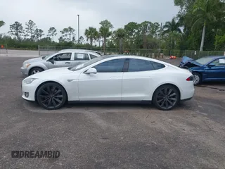 2013 Tesla Model S Performance with VIN 5YJSA1DP9DFP04076, listed as a IAAI auction lot 42185465 with 179,640 mi miles and . Bid and sale history available at DreamBid. Image 14.