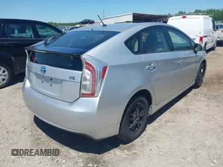 2015 Toyota Prius Four with VIN JTDKN3DU8F2000933, listed as a IAAI auction lot 42113155 with 212,443 mi miles and . Bid and sale history available at DreamBid. Image 4.