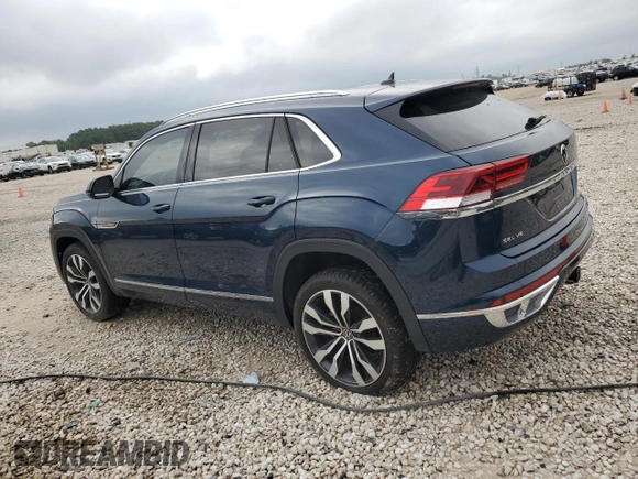 2023 Volkswagen Atlas SEL Premium R-Line z VIN 1V2FE2CA7PC224093, wystawiony jako Copart lot #59274104 z przebiegiem 6 716 mil mil oraz Czysty tytuł • Clean title. Historia ofert i sprzedaży dostępna na DreamBid. Obrazek 2.