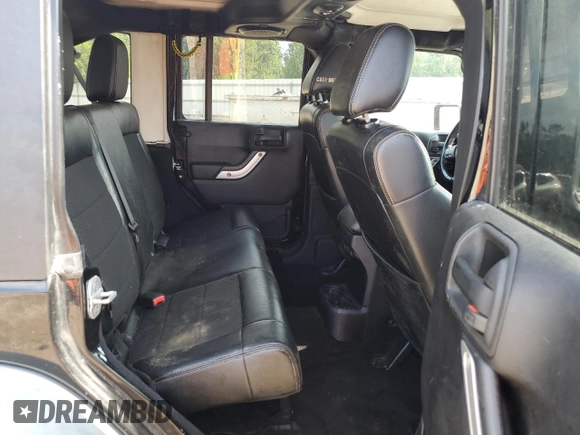 2012 Jeep Wrangler Unlimited Call of Duty MW3 with VIN 1C4BJWFG2CL191940, listed as a Copart auction lot 65955465 with 108,033 mi miles and Clean title. Bid and sale history available at DreamBid. Image 11.