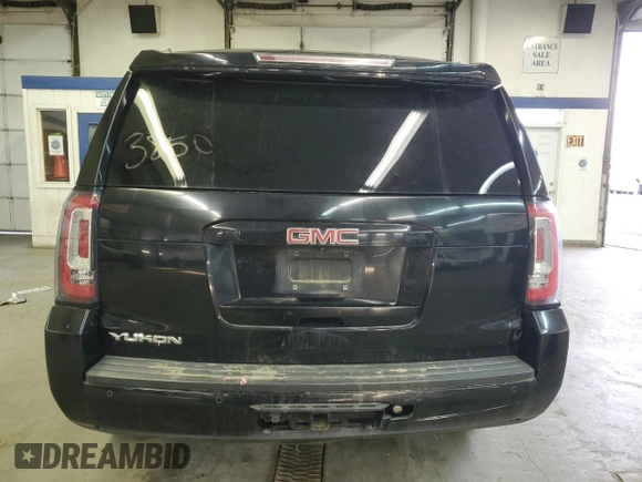 2015 GMC Yukon SLE with VIN 1GKS2AKC6FR229744, listed as a Copart auction lot 88270295 with 215,762 mi miles and Salvage Title. Bid and sale history available at DreamBid. Image 6.