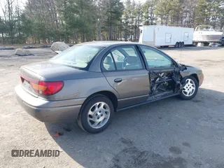 2000 Saturn SL z VIN 1G8ZK5275YZ244530, wystawiony jako IAAI lot #41784896 z przebiegiem 50 332 mil mil oraz . Historia ofert i sprzedaży dostępna na DreamBid. Obrazek 4.