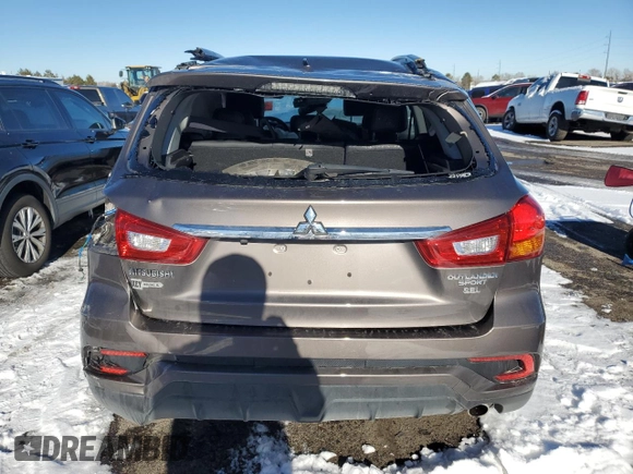2018 Mitsubishi Outlander SEL z VIN JA4AR4AW5JZ016013, wystawiony jako Copart lot #87653585 z przebiegiem Nie podano mil oraz Szkody całkowita. Historia ofert i sprzedaży dostępna na DreamBid. Obrazek 6.