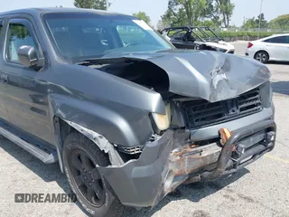 2007 Honda Ridgeline RTL with VIN 2HJYK16547H502601, listed as a IAAI auction lot 42484634 with 197,253 mi miles and . Bid and sale history available at DreamBid. Image 6.
