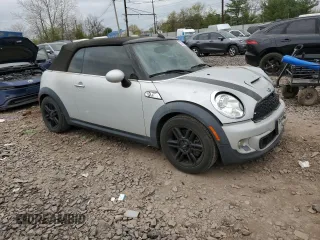 2015 MINI Convertible S with VIN WMWZP3C57F2A91437, listed as a Copart auction lot 53883525 with 28,185 mi miles and Salvage title. Bid and sale history available at DreamBid. Image 4.