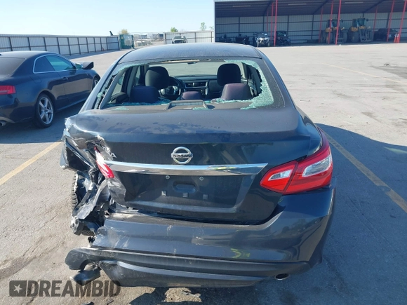 2016 Nissan Altima S z VIN 1N4AL3AP9GC121181, wystawiony jako IAAI lot #42227421 z przebiegiem 135 545 mil mil oraz . Historia ofert i sprzedaży dostępna na DreamBid. Obrazek 16.