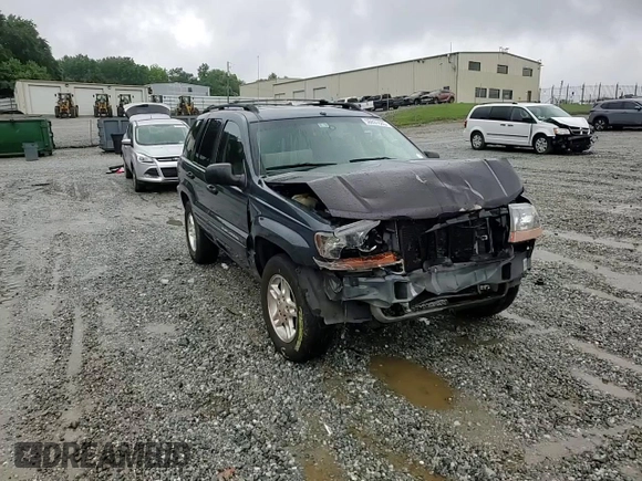 2004 Jeep Grand Cherokee Laredo with VIN 1J4GX48SX4C201569, listed as a Copart auction lot 58631585 with 271,124 mi miles and Salvage title. Bid and sale history available at DreamBid. Image 15.