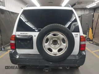 2002 Suzuki Grand Vitara JLX z VIN JS3TD62V824156720, wystawiony jako IAAI lot #42058409 z przebiegiem Nie podano mil oraz . Historia ofert i sprzedaży dostępna na DreamBid. Obrazek 15.
