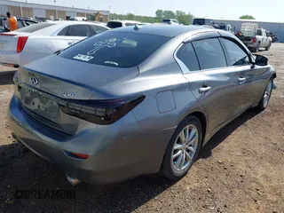 2015 Infiniti Q50 z VIN JN1BV7AP6FM335914, wystawiony jako IAAI lot #42065648 z przebiegiem 192 986 mil mil oraz . Historia ofert i sprzedaży dostępna na DreamBid. Obrazek 4.