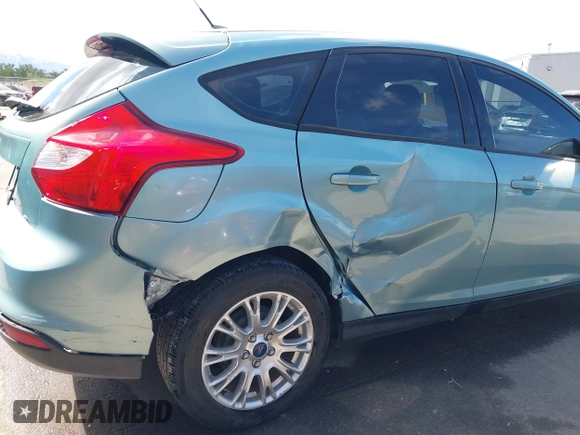 2012 Ford Focus SE with VIN 1FAHP3K24CL394495, listed as a IAAI auction lot 42034167 with 66,833 mi miles and . Bid and sale history available at carsss.com. Image 6.