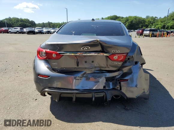 2015 Infiniti Q50 Premium z VIN JN1BV7ARXFM391291, wystawiony jako Copart lot #61765885 z przebiegiem 129 617 mil mil oraz Szkoda całkowita • Salvage title. Historia ofert i sprzedaży dostępna na DreamBid. Obrazek 6.